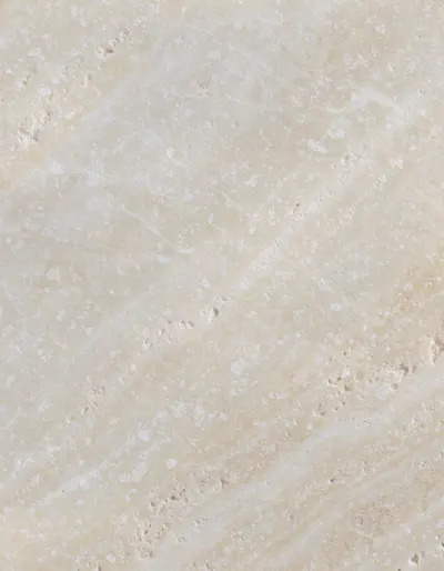 A polished slab of Galala Classic, the Egyptian cream limestone, calm and evenly toned